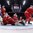 COLOGNE, GERMANY - MAY 15: Denmark's Sebastian Dahm #32 makes the save against Itay's Michele Marchetti #68 while Patrick Russell #60, Jesper B. Jensen #41, Phillip Bruggisser #2 and Tommaso Goi #58 look on during preliminary round action at the 2017 IIHF Ice Hockey World Championship. (Photo by Andre Ringuette/HHOF-IIHF Images)


